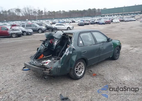 2000 Toyota Corolla Ce из США, поврежденный, VIN 2T1BR12E9YC277308